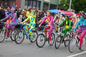 Naked painted cyclists at Fremont Fair