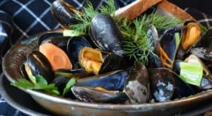 A bowl of cooked mussels