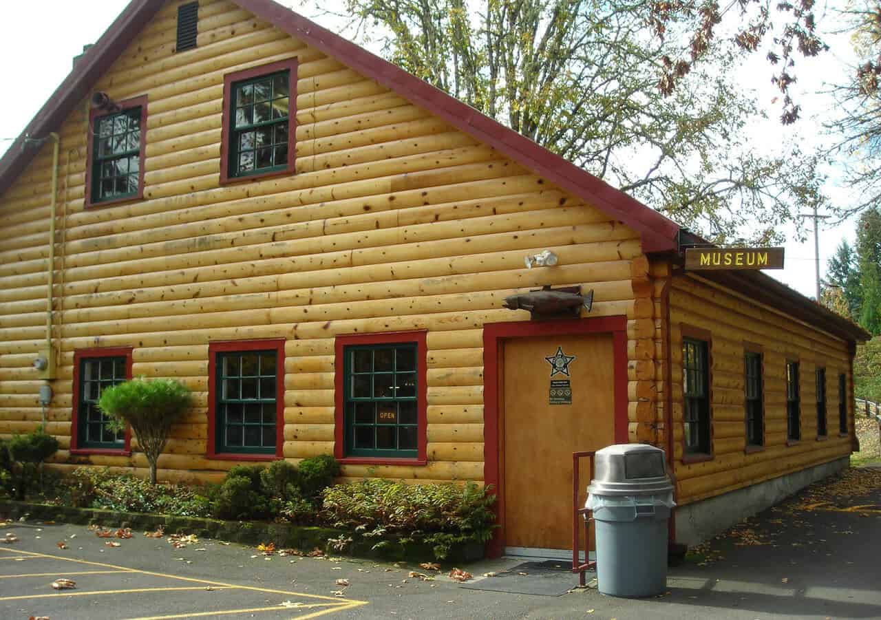 Rustic wood-sided museum building at the Willamette Fish Hatchery in Oakridge Oregon